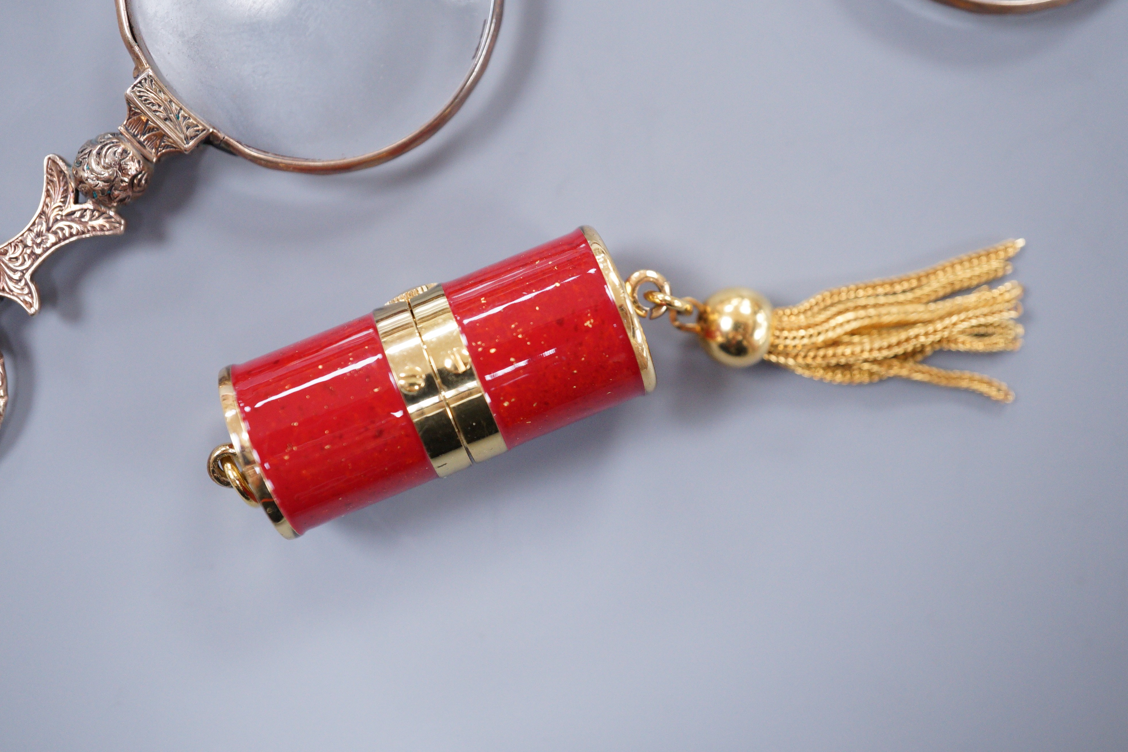 A small gold plated lorgnette, 7.5cm and a J Bogard gilt metal pendant timepiece